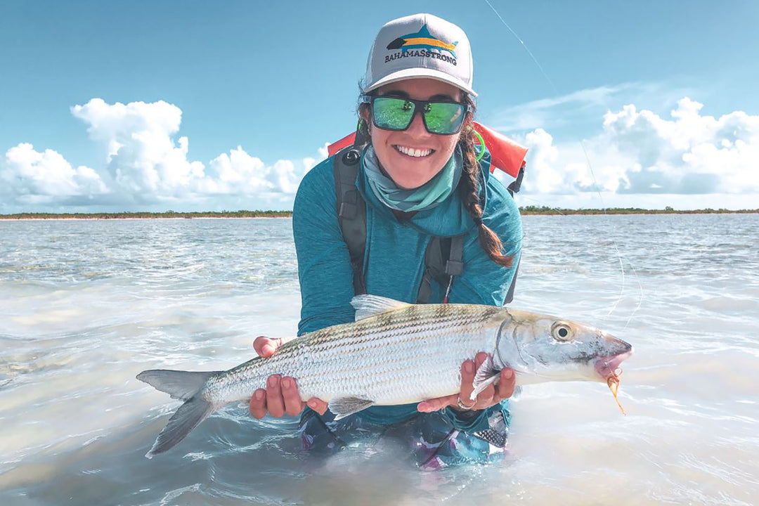 Andros South Legend Liz F. showcasing a beautiful bonefish caught on the famous flats of Andros Island's "West Side".
