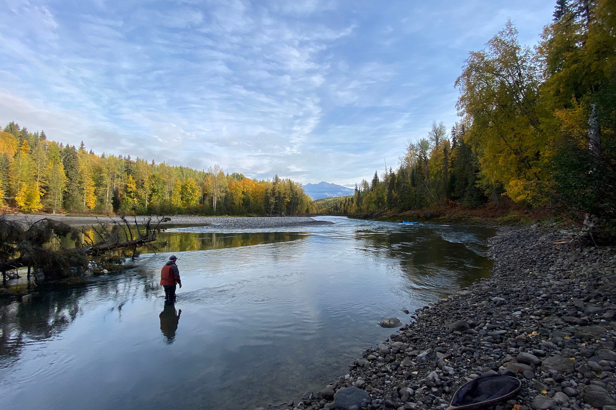 An angler fishing the Bulkley River for steelhead in northern British Columbia
