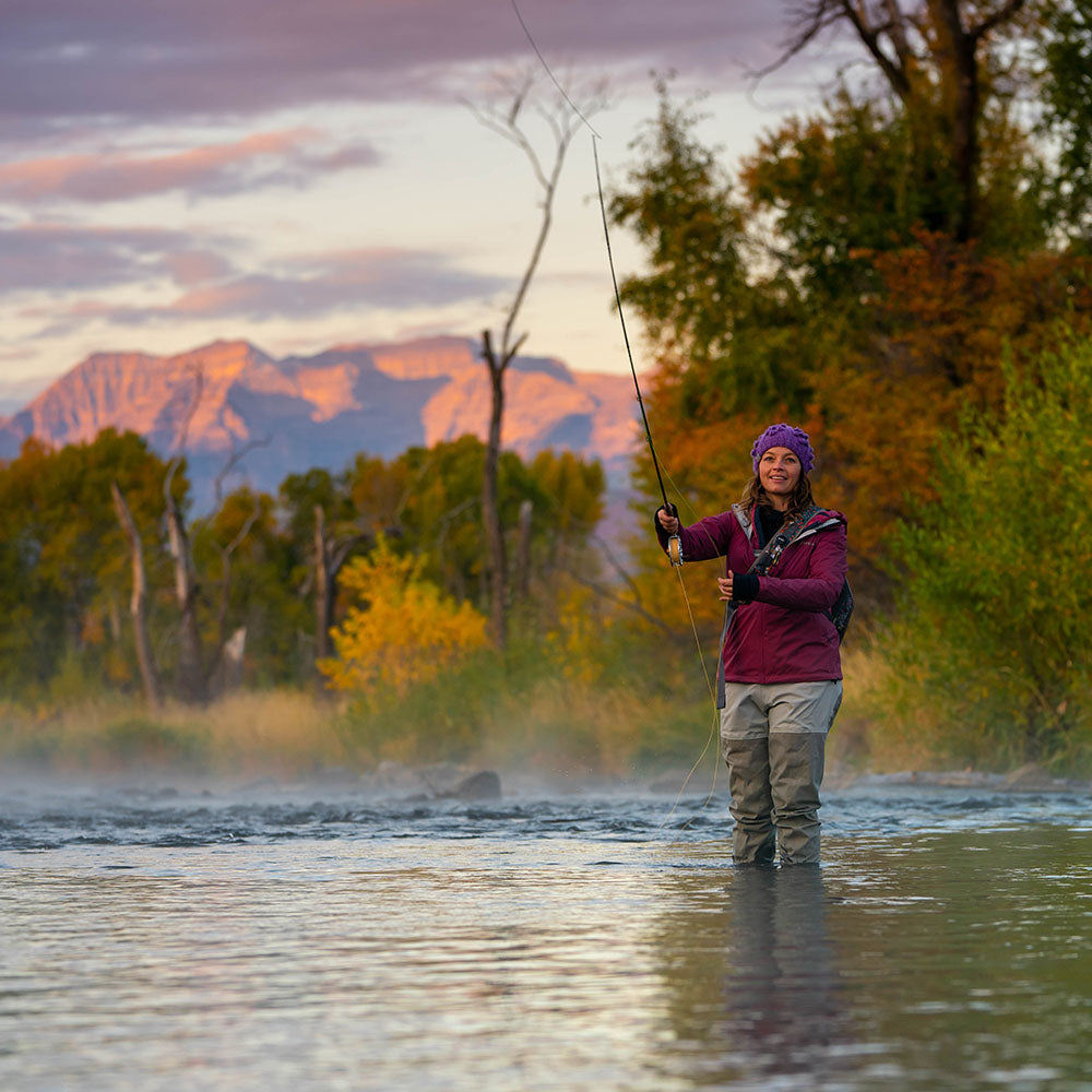 Brooke fishing Utah's Provo River during a beautiful fall morning.