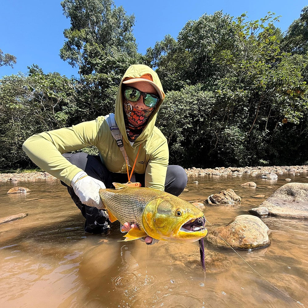 Brooke showing off a nice Golden Dorado caught on Bolivia's Itirisama River.