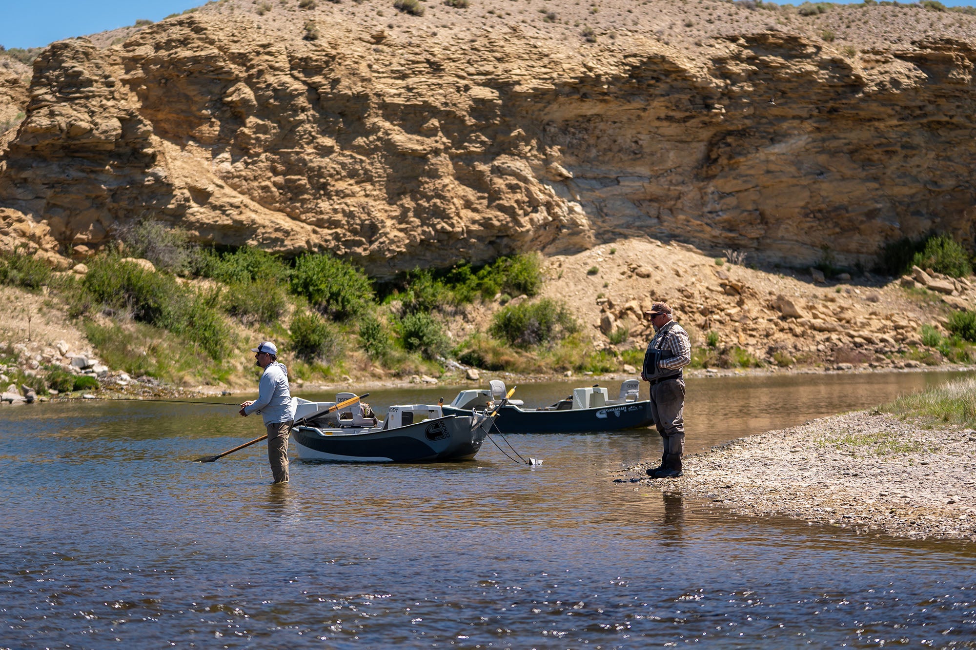 An angler and guide fishing Wyoming's Green River below Fontanelle Reservoir. 